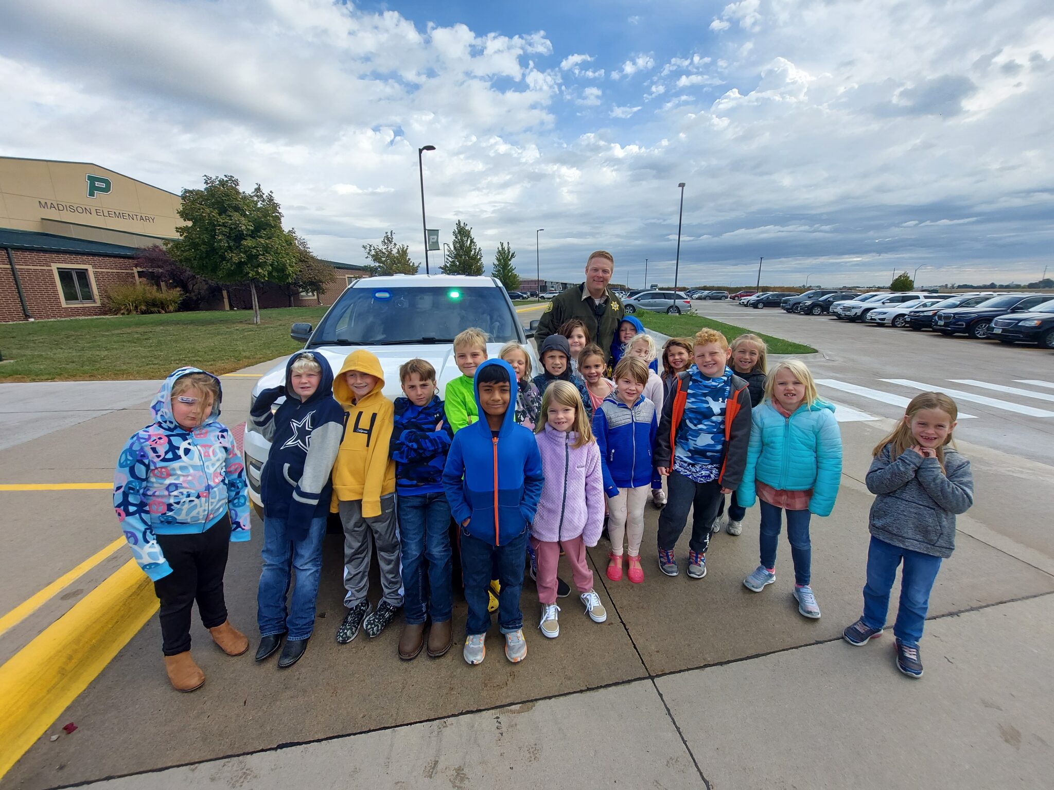 Second Graders Learn from Local Police Lieutenant Pella Community Schools